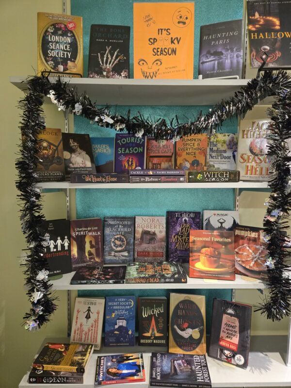 The Friends' book sale special sale section, with Halloween decor.